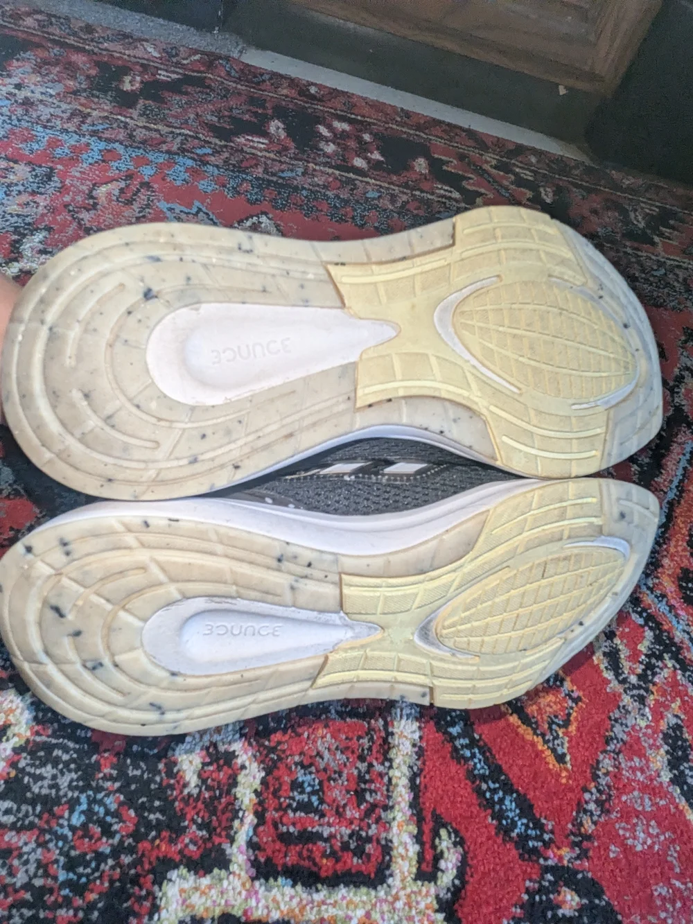 adidas Black Athletic Running Shoes with White Stripes and Subtle Yellow Accent